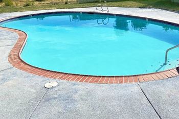 a large blue swimming pool at Talavera